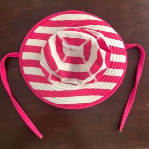 Like new Hanna Andersson pink and white striped hat with ties